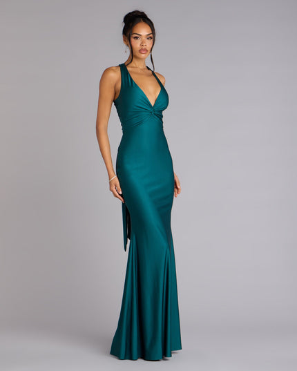 This prom dress, the Adrianne Plunge Bow Mermaid Formal Dress , features a sleek, floor-length design with trend-forward details that capture the excitement of Prom 2026.