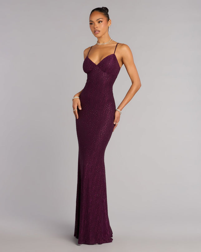 This purple prom dress, the Skylar Rhinestone Tie Back Formal Dress , features a sleek, floor-length design with trend-forward details that capture the excitement of Prom 2026.