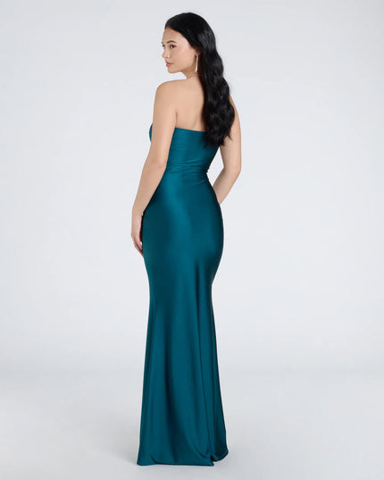 The Cheryl Strapless Slit Mermaid Formal Dress in hunter is a stunning green prom dress designed to capture attention with its fresh or bold color and effortlessly stylish silhouette.