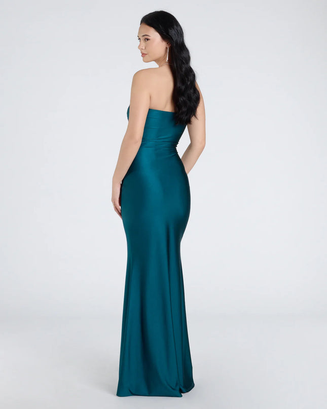 The Cheryl Strapless Slit Mermaid Formal Dress in hunter is a stunning green prom dress designed to capture attention with its fresh or bold color and effortlessly stylish silhouette.