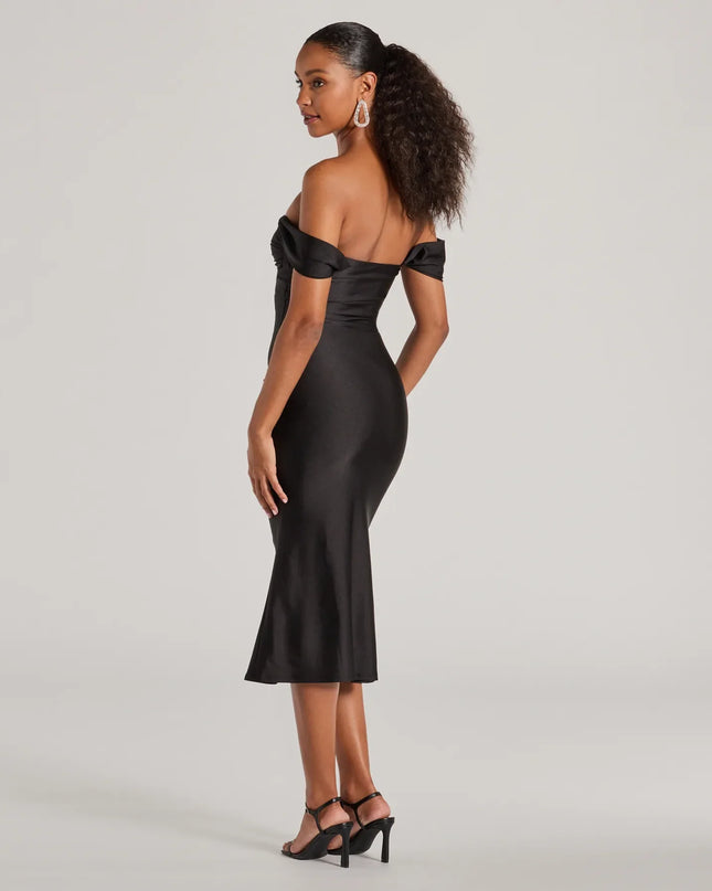 Own the evening in the Exceptional Off-The-Shoulder Flared Midi Dress in black, a cocktail dress perfect for rooftop parties and stylish soirées.