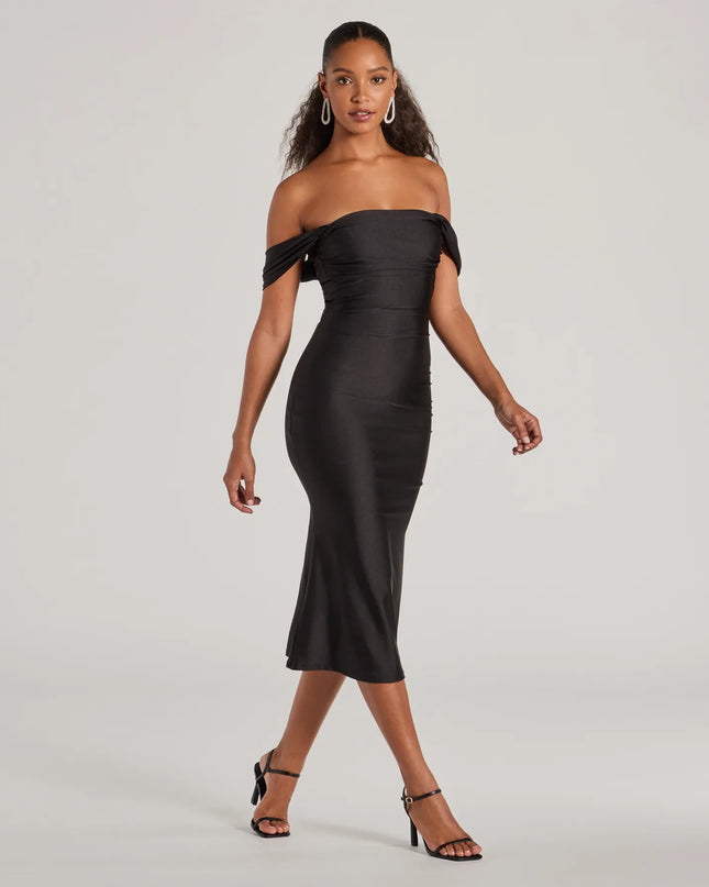 The Exceptional Off-The-Shoulder Flared Midi Dress is your new go-to black dress—effortless, versatile, and made to update your spring or summer style in seconds.