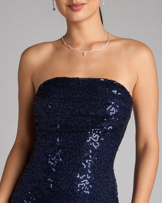 The Sparkle Goals Sequin Tube Mini Dress is your new go-to navy blue dress—effortless, versatile, and made to update your party-ready style in seconds.