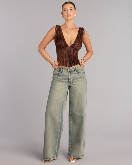 Create a sculpted look with the Caught Your Eye Flocked Velvet Corset Top in brown, a corset top featuring structured seams and a curve-hugging fit.