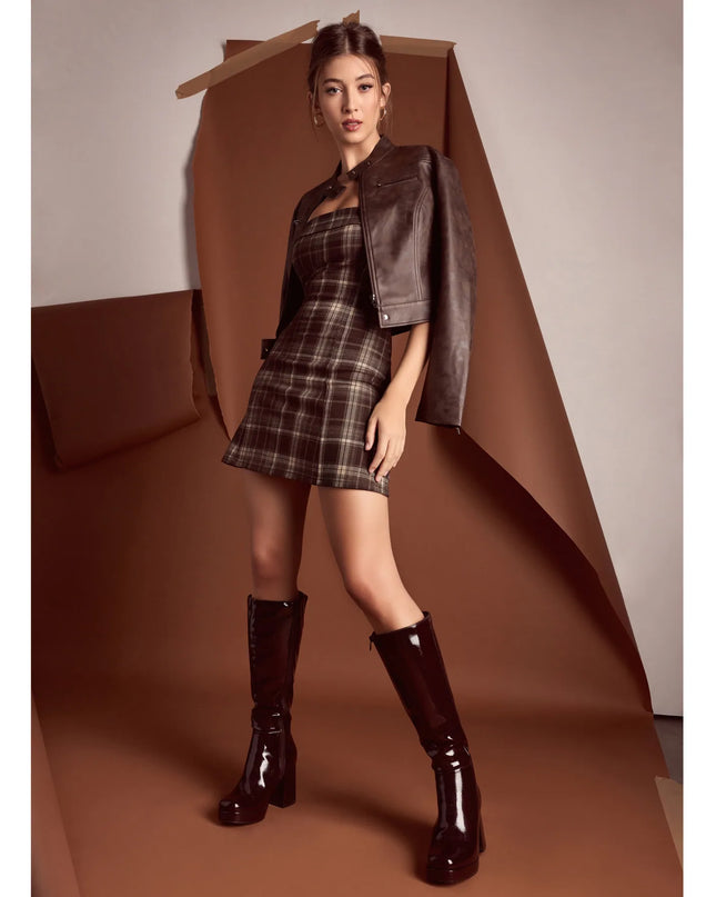 The Along For The Ride Faux Leather Biker Jacket in brown is a women's workwear piece offering a trendy style and unique accents, perfect for effortlessly creating an outfit-of-the-day look that transitions your office look to going-out ready.