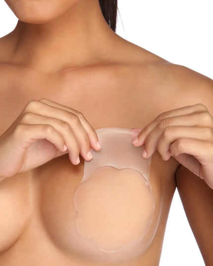 The Reusable Gel Lift Pasties in natural brings sleek style to any graduation outfit, from cap and gown to after-party.