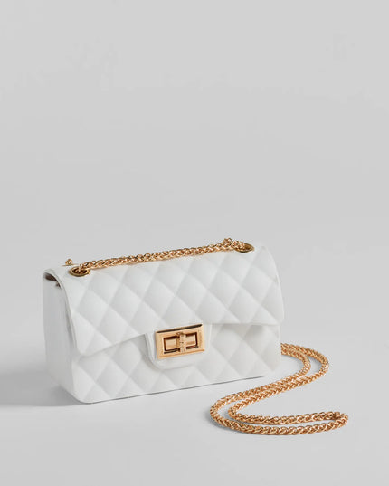 
Upgrade your style game for 2025 with the Trendsetter Quilted Diamond Small Crossbody in white, perfect for any fashion-forward wardrobe.